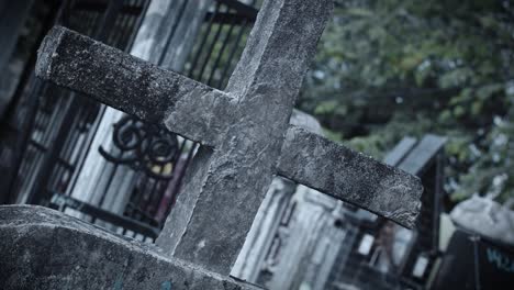 christian cemetery with horror color grading, dutch angle