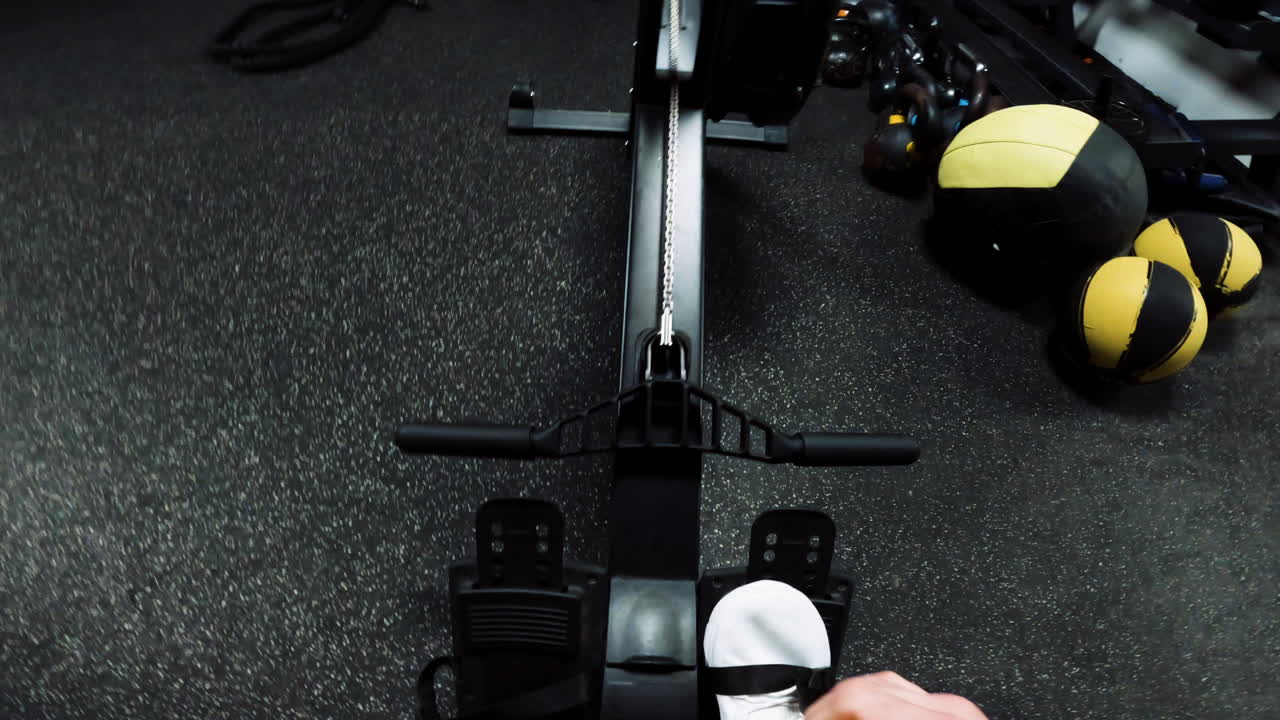 Gym Workout Session on Rowing Machine