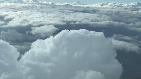 overflying the top of a cumulus cloud during the descent