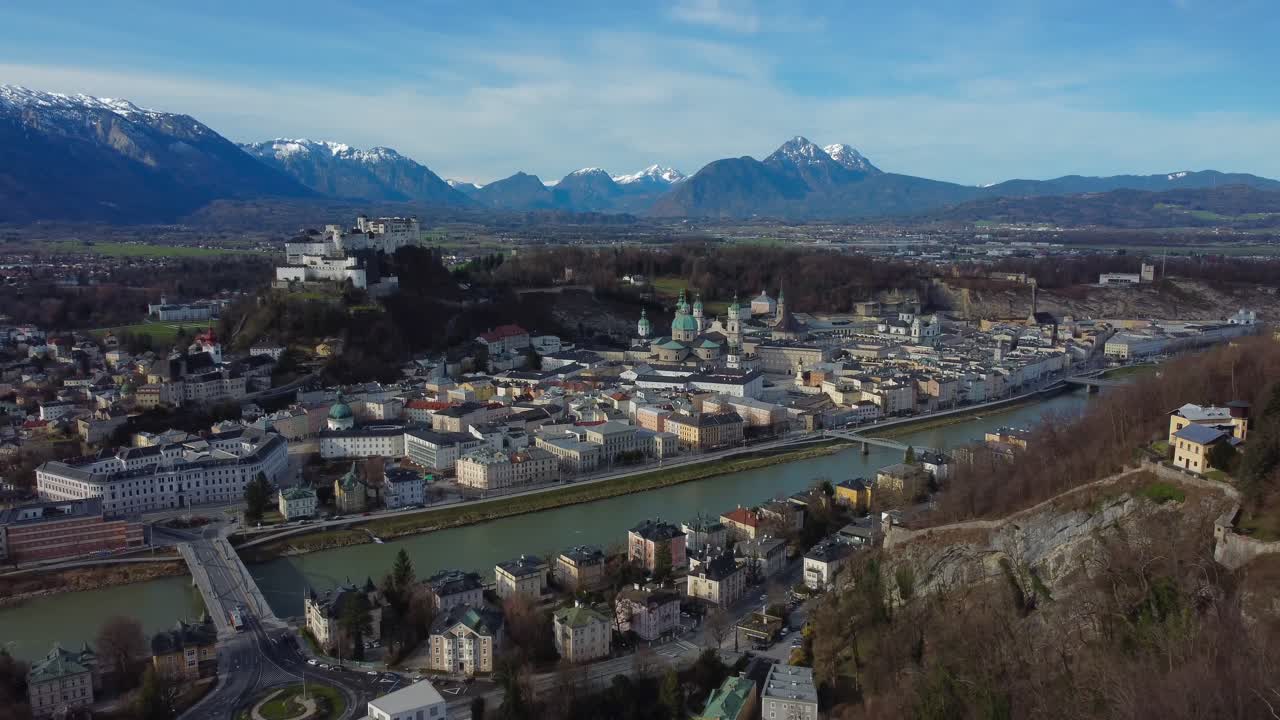 Cinematic drone footage of Salzburg Cityscape with Hohensalzburg and Northern Limestone Alps