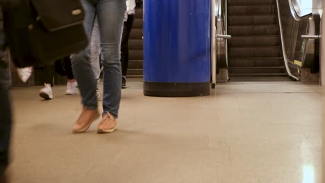 subway escalator with people