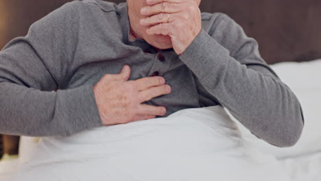 senior man coughing with chest infection