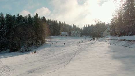 Drone-Shot-over-a-village-in-the-forest