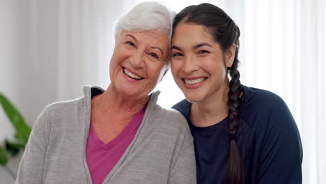 Happy,-portrait-of-mom-and-grandmother-in-home