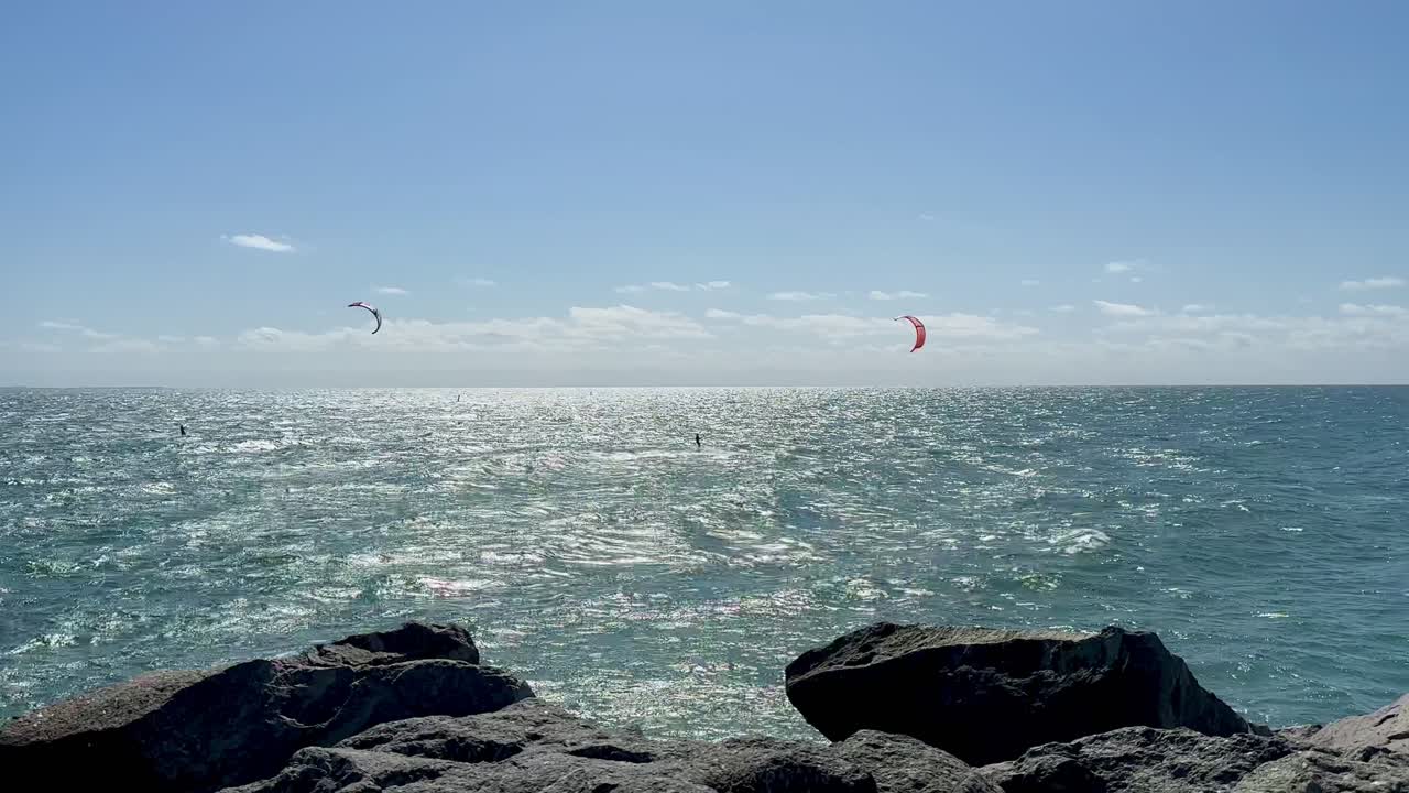 2 Kite Surfers off Cottesloe Groin, blue Indian Ocean, Western Australia
