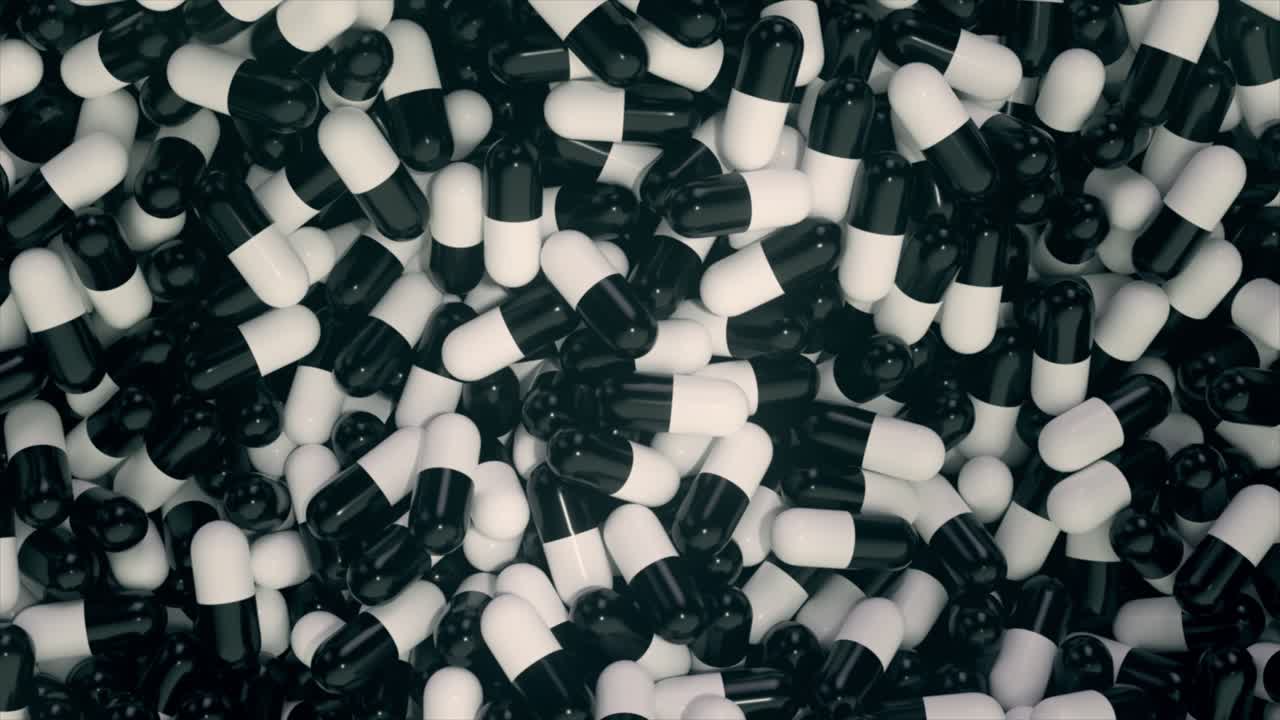 검은색과 색의 알약