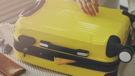 woman preparing summer luggage