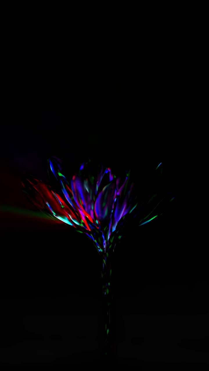 A vibrant, neon-colored flower glowing against a dark background, captured from a low angle