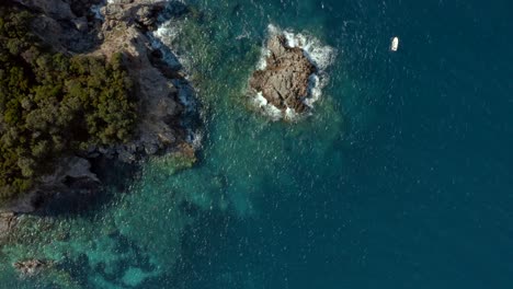 rocky ocean coast of ionion island in mediterranean sea by greece, aerial