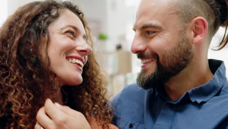 happy couple talking and laughing while relaxing