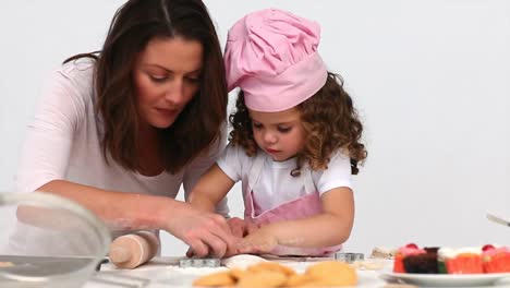 Mother-baking-cookies-with-her-daughter