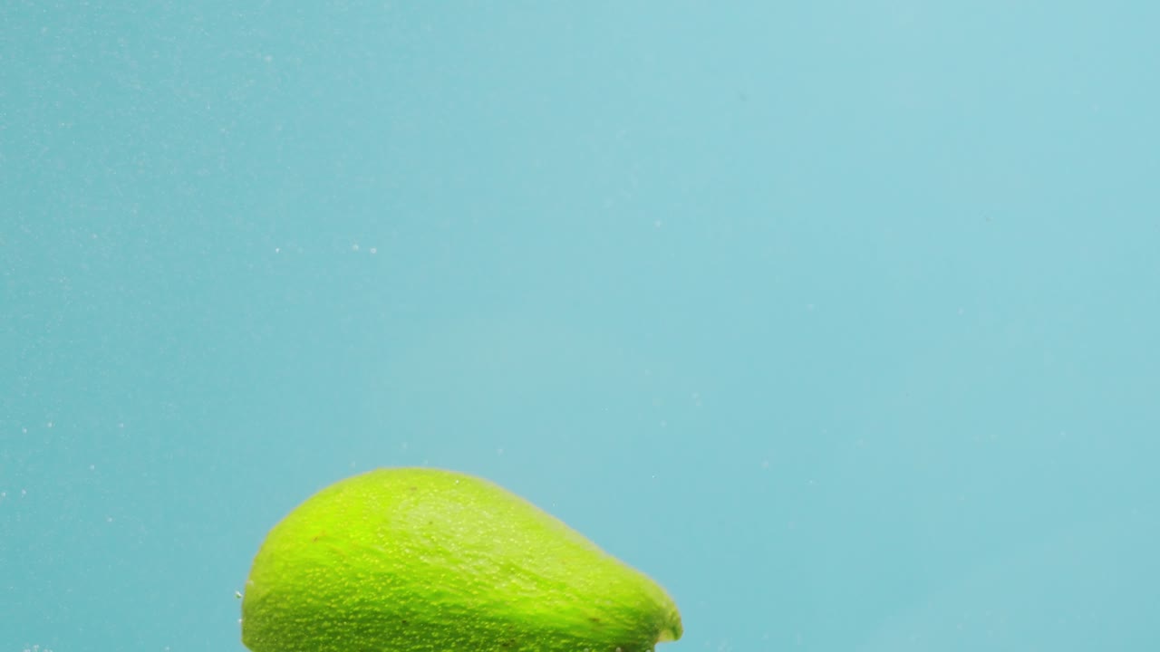 Avocado Slice Floating Underwater