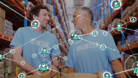 Animation-of-network-of-profile-icons-over-two-diverse-male-volunteers-high-fiving-each-other
