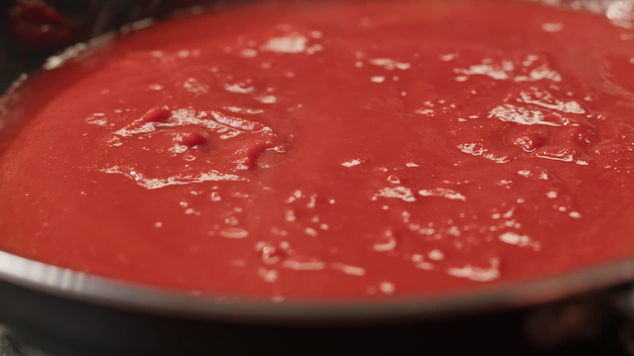 Tomato Sauce Cooking in a Pan