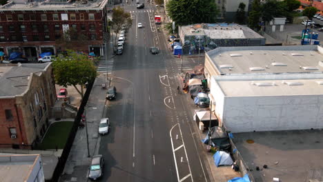 aerial view of a homeless encampment on an urban street