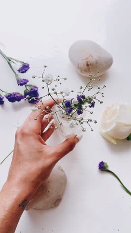 handheld floral arrangement with small flowers