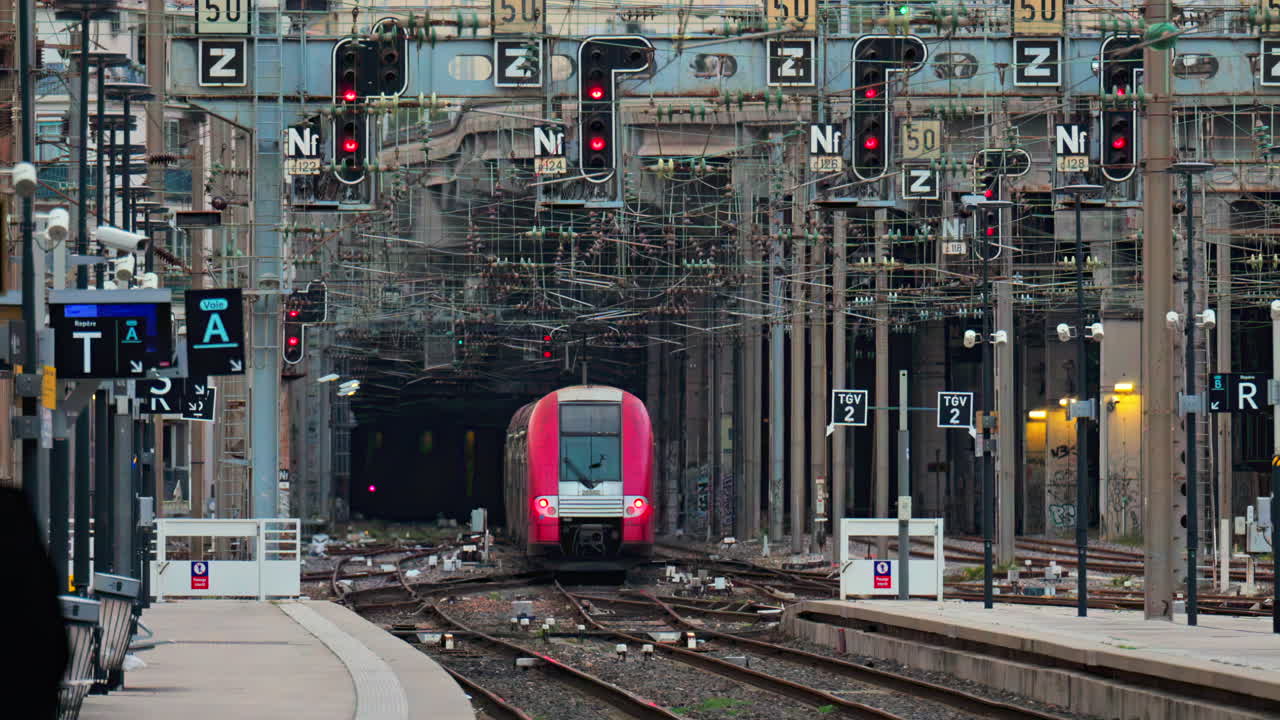 Nice, France - February 4, 2025: Trains moving on the rails in the Nice Ville Central train station