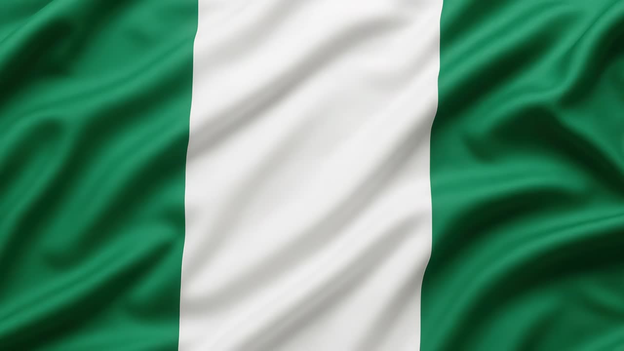 A close-up video of the Nigerian flag waving gently, showcasing its vibrant green and white colors