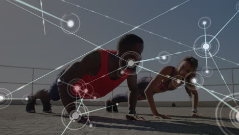 animation of network of connections over couple doing push-ups outdoors