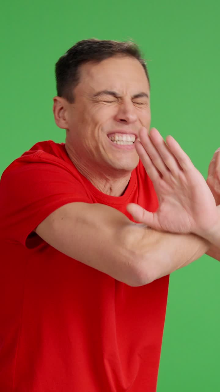 Man arguing with someone on green screen background