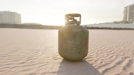 old-rusted-metal-gas-tank-on-the-beach