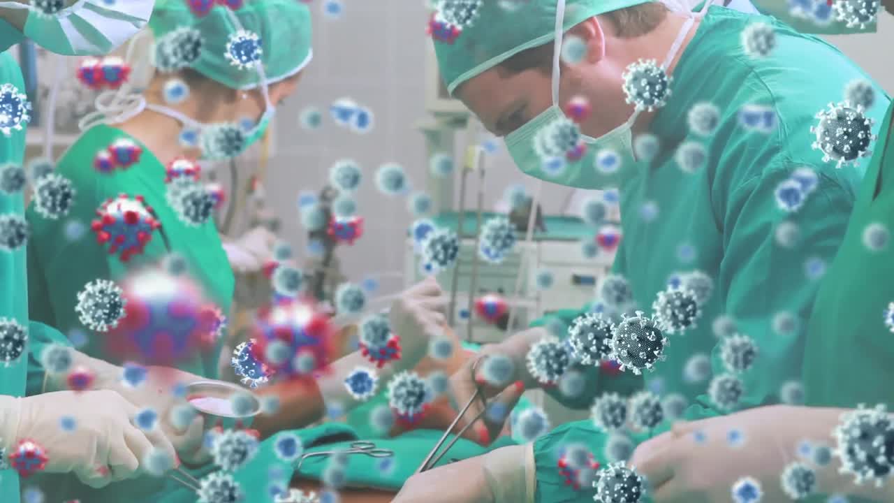수술실의 외과 의사들에 대한 코로나19 바이러스 세포의 애니메이션