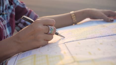 the girl searching location in map for travel journey