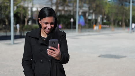 Happy-hindu-woman-having-video-call-through-phone