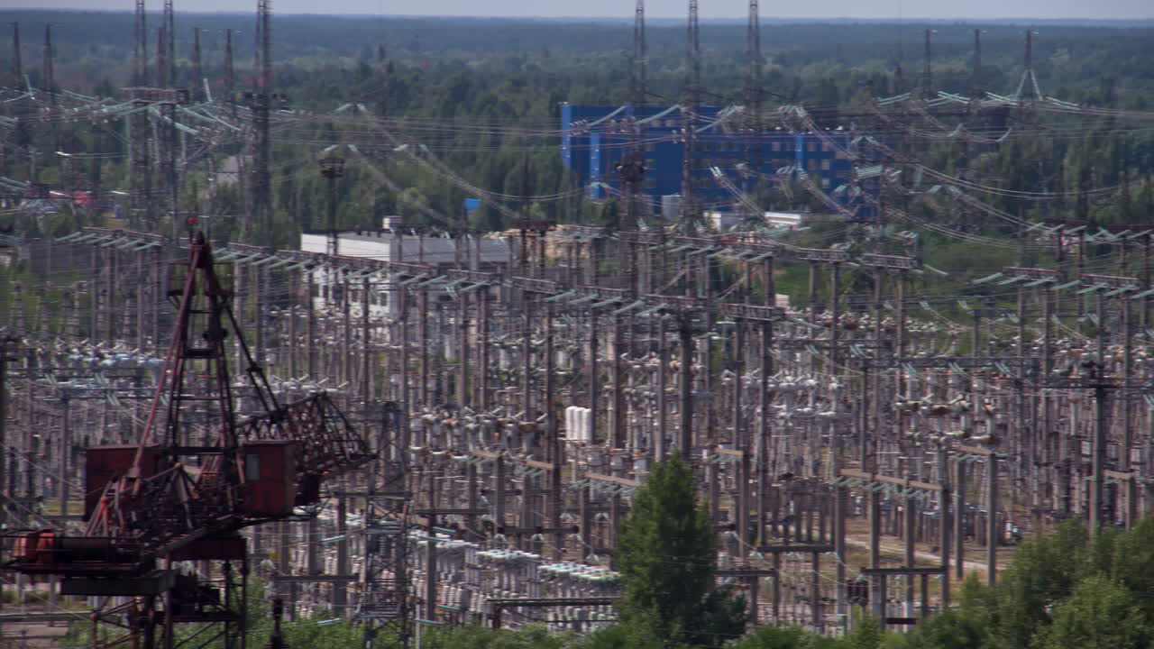 Transformer Substation And High-Voltage Power Lines At The Chernobyl Nuclear Power Plant In Ukraine. Panning Right Shot