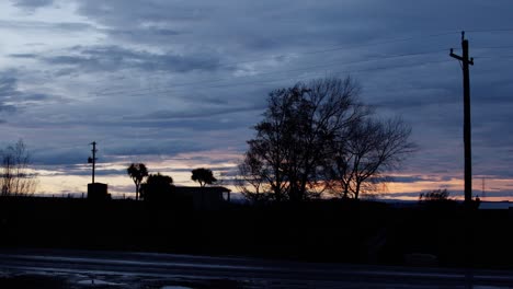 Sunset-in-New-Zealand-with-red-sky-and-beautiful-foreground