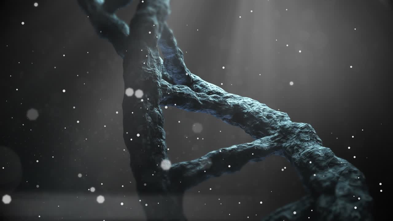 Animazione di punti che cadono su un filamento di DNA che ruota su sfondo scuro