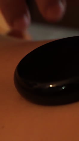 close-up of hands massaging a body