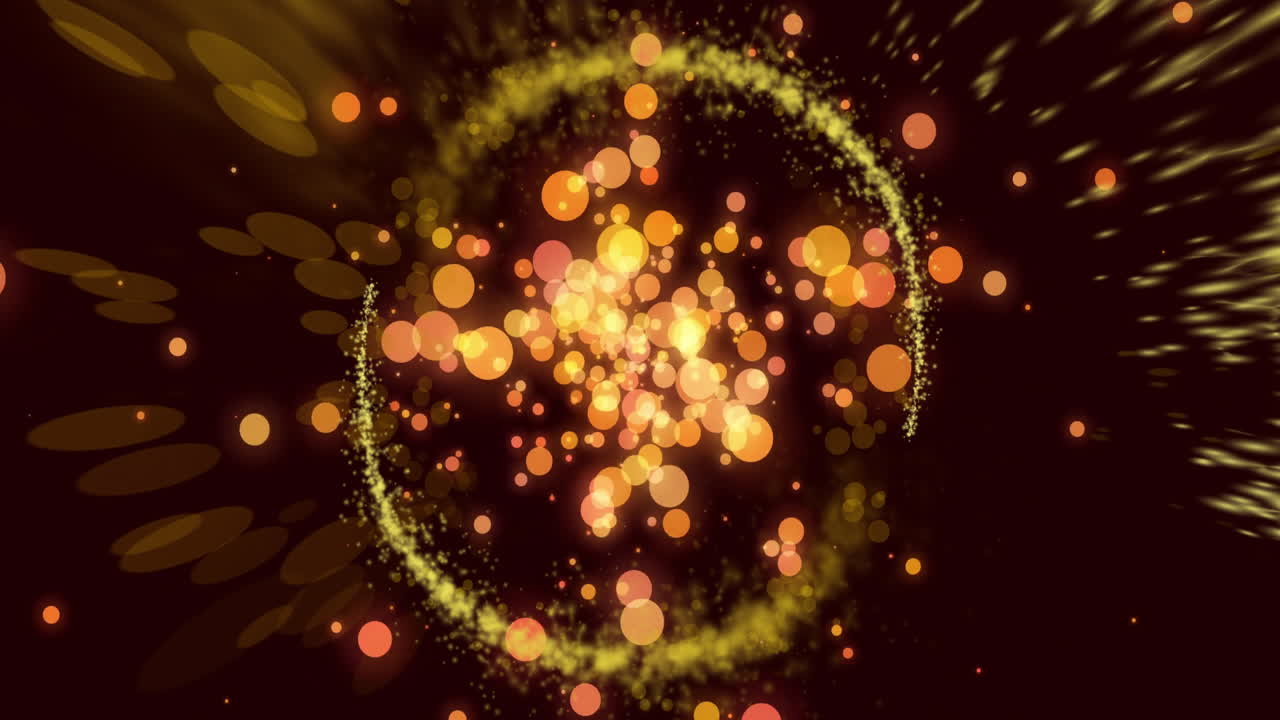 검은색 배경에 노란색 빛의 흔적과 반점의 애니메이션