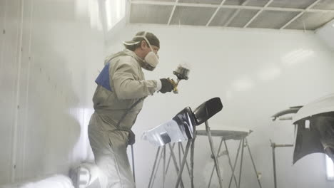 car body painting in a repair shop