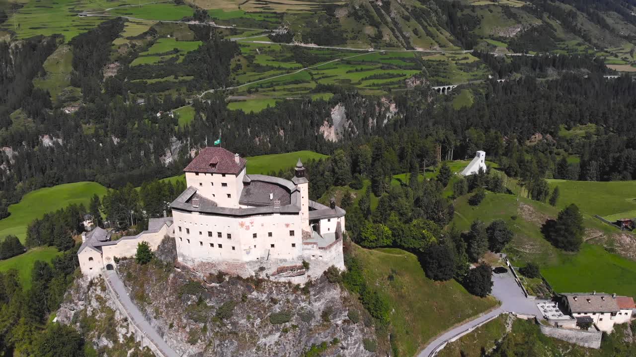 Aerial: medieval Tarasp castle from the air 2