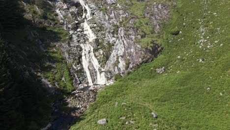 Drone-shot-of-a-large-waterfall-in-Ireland
