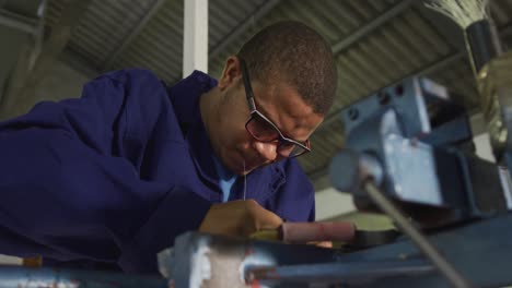 mixed race man working in factory