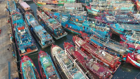 busy fishing port aerial view