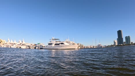 a boat sailing near the gold coast marina