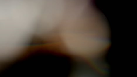 multicolored light leaks footage on black background, lens flare leak burst overlays transitions