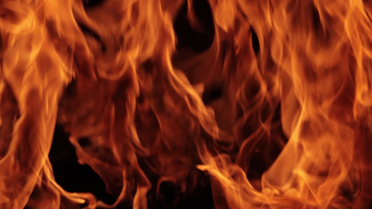 Flames of fire on black background in slow motion