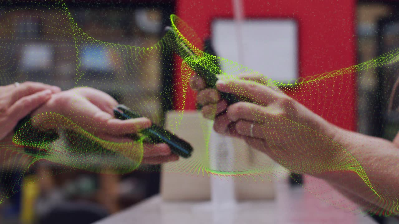 Right hands bringing phone closer, tilting and aligning over palm, particles syncing retail scan