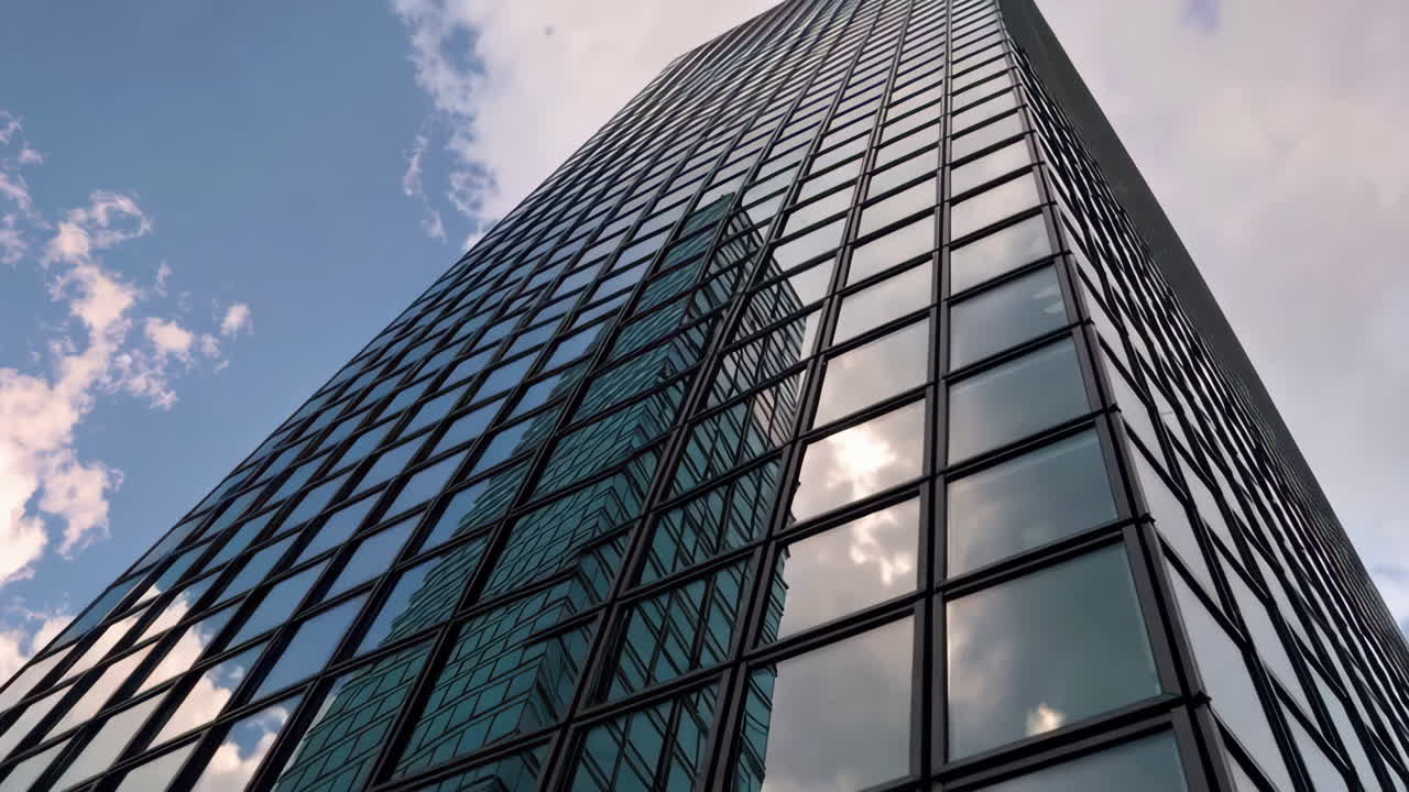 Modern Skyscraper with Cloud Reflections