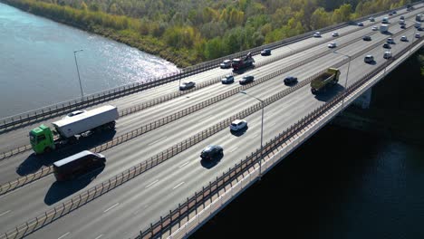 Aerial-view-of-road-bridge-highway-across-the-river-in-city-area