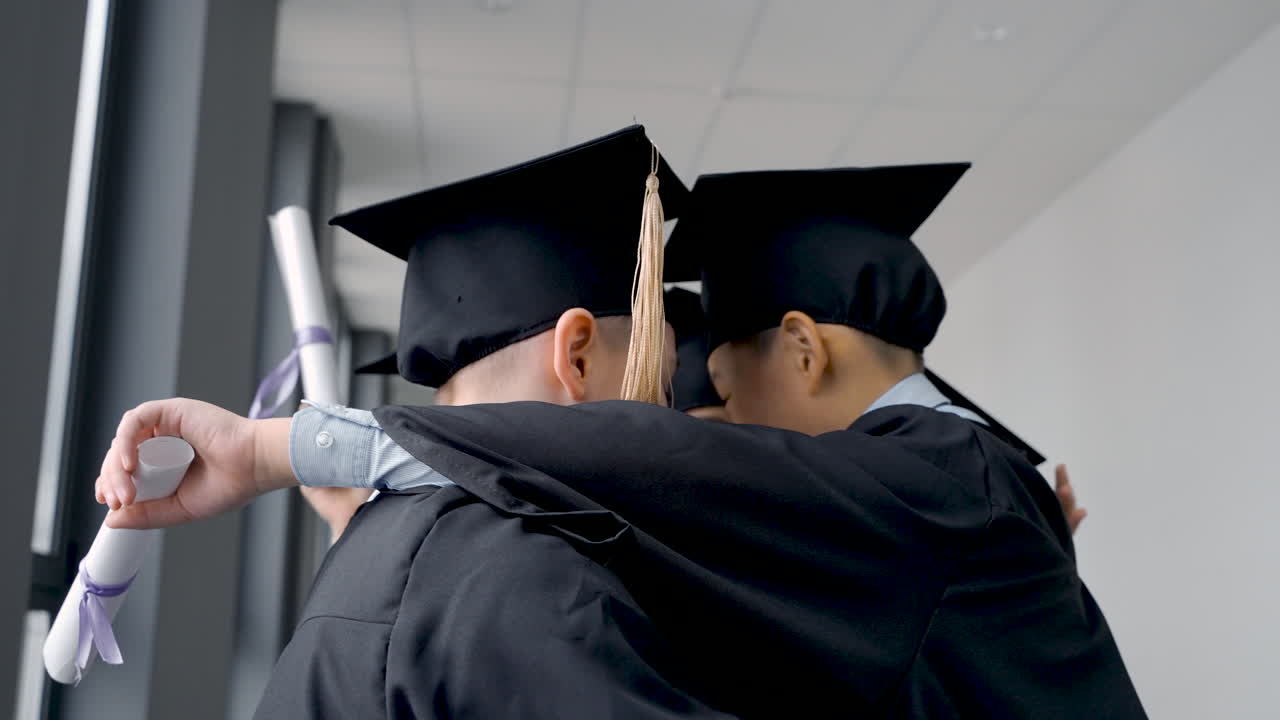 Group Of Happy  Preschool Students In Mortarboard And Gown 7