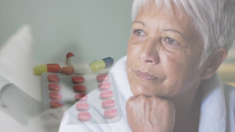 animation of syringe, stethoscope and medication over worried senior woman at home