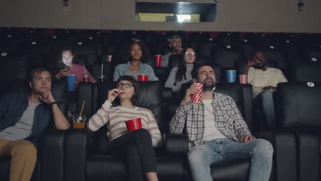 moviegoers watching a movie in a theater