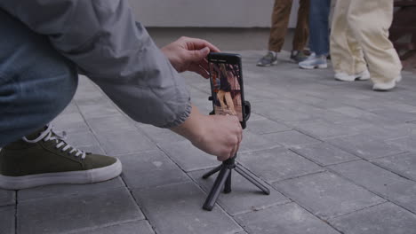 friends practising dances on the street