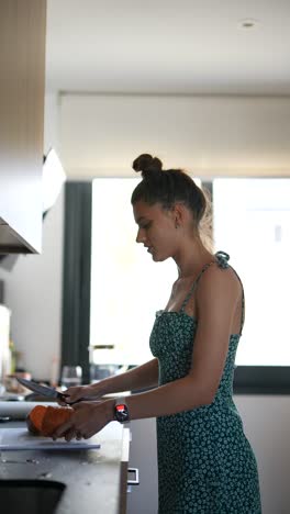 woman cooking sweet potatoes in the kitchen