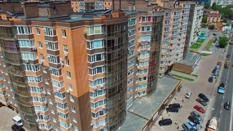 Urban background. Construction of modern district in the city. New residential area with high-raised buildings. Aerial view.